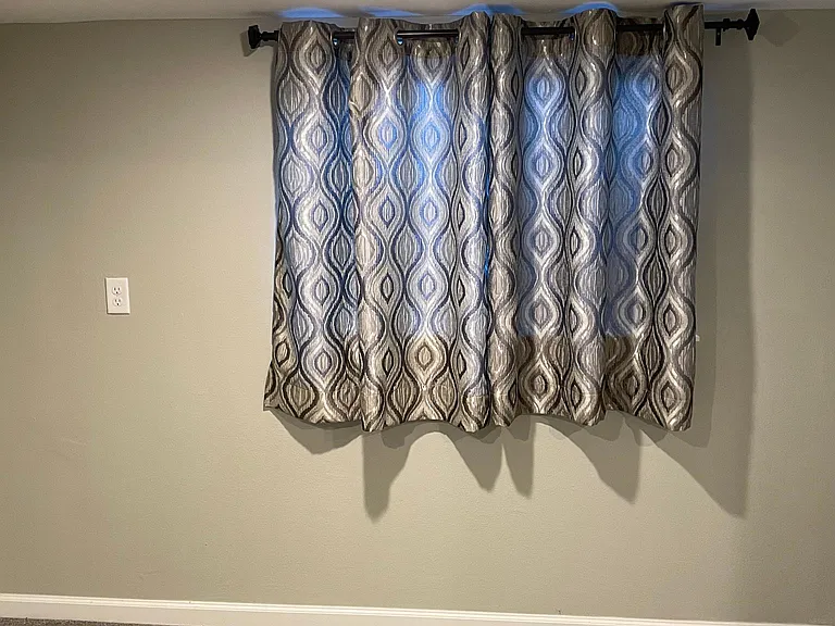 Curtains and rod are included. __