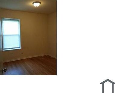 5th image of 6044 S Prairie Ave Unit 1