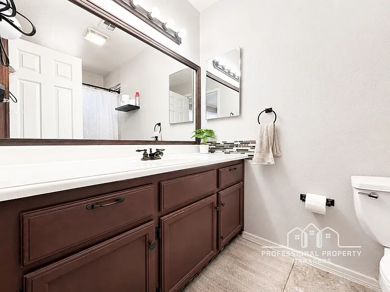 7176 E 26th Pl — Photo 15