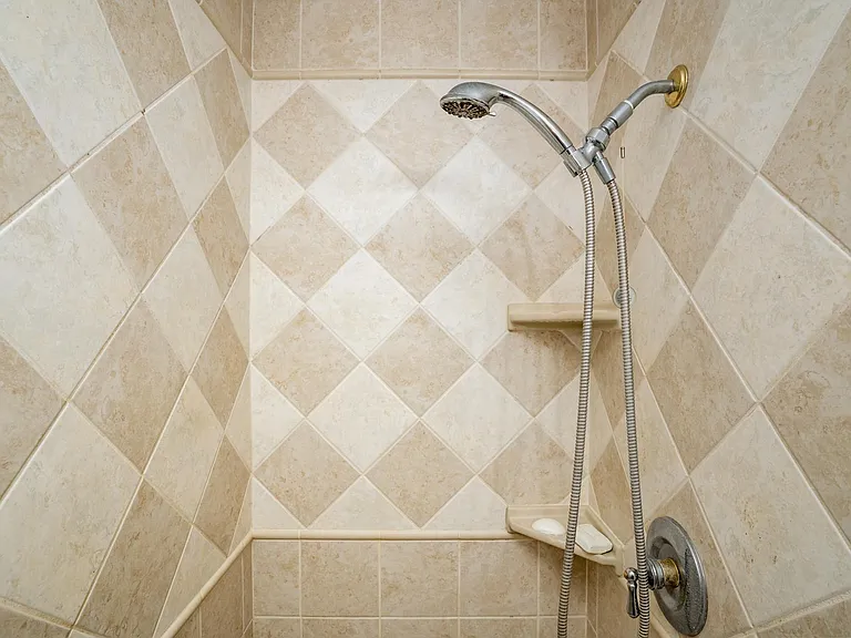 Enlarge master shower tiled.