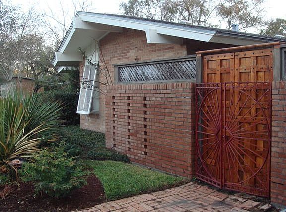 Side of Home w/Custom Spanish inspired gate