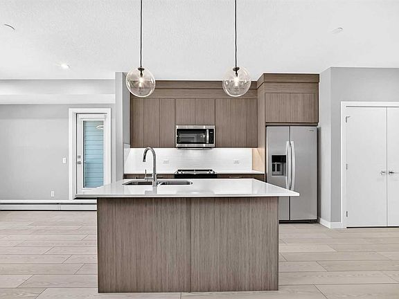 5th image of 63 W Corner Glen Cres NE #1217
