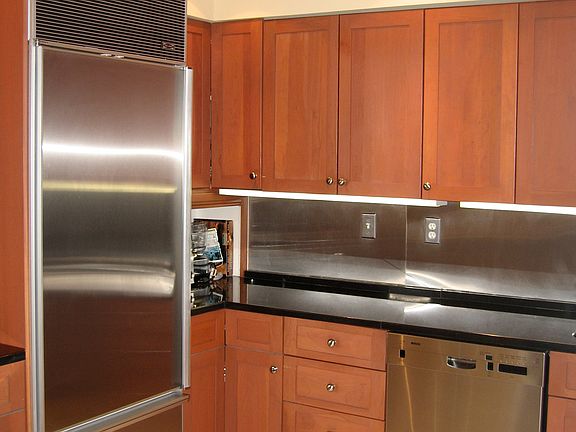 Stainless Sub Zero Refrigerator and Bosch Dishwasher