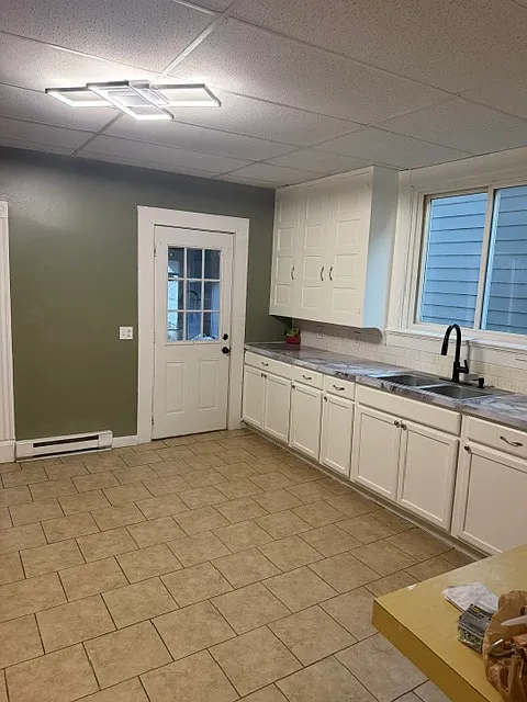 4 bed, 1.5 bath, 1350 sqft, $1,700 — Photo 3