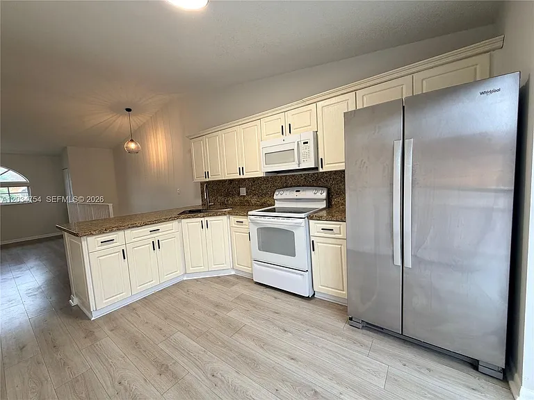 7730 W 34th Ln #14-202 — Photo 16
