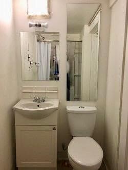 Bath with shower