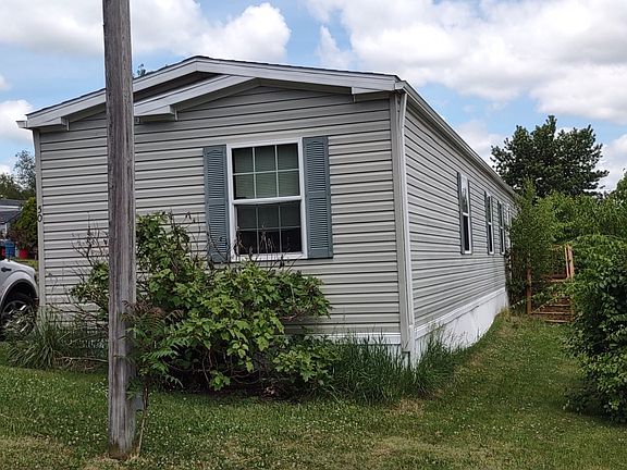 Exterior Image-2-REDMAN 50 Maple Manor