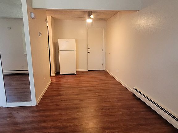 dining room and garage door. White refrigerator no longer there.