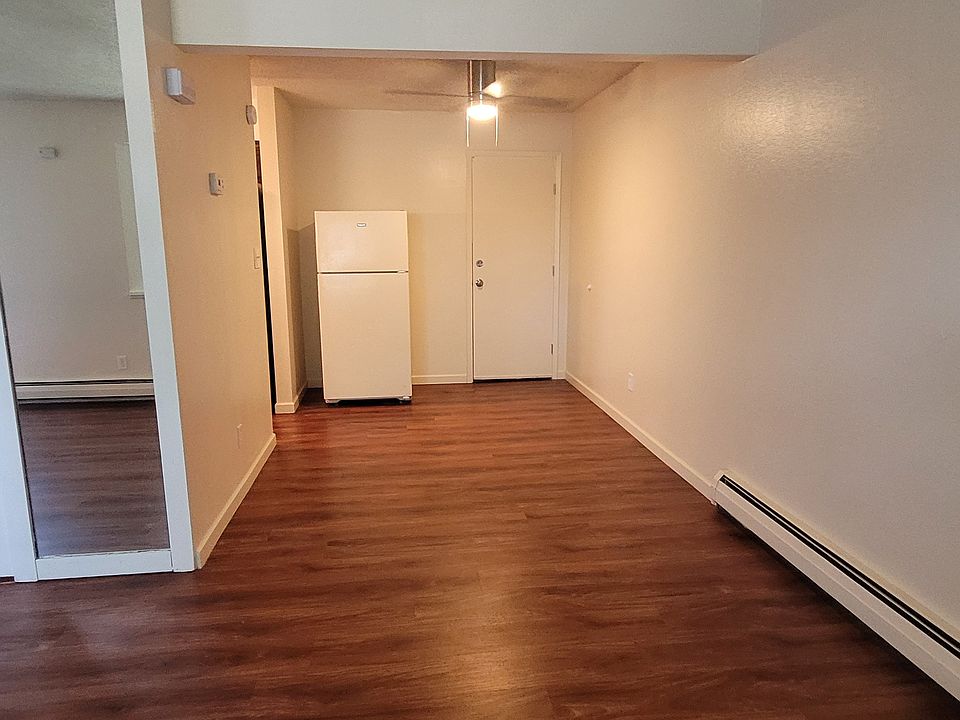 dining room and garage door. White refrigerator no longer there.