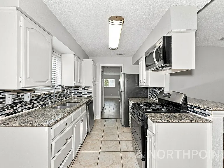 2616 Alamain Dr — Photo 5