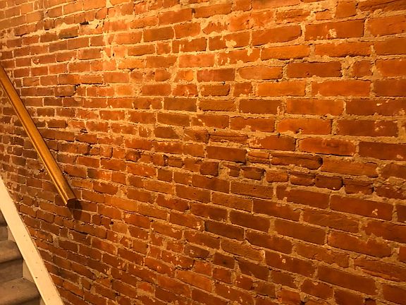 Brick wall at front door