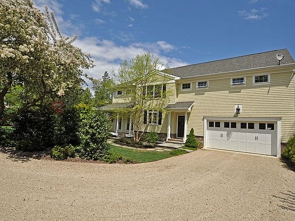Side view with heated 2 car garage
