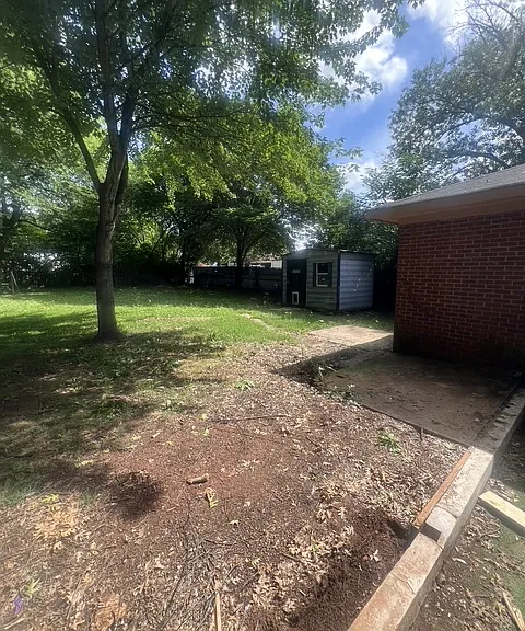 Spacious backyard with shed