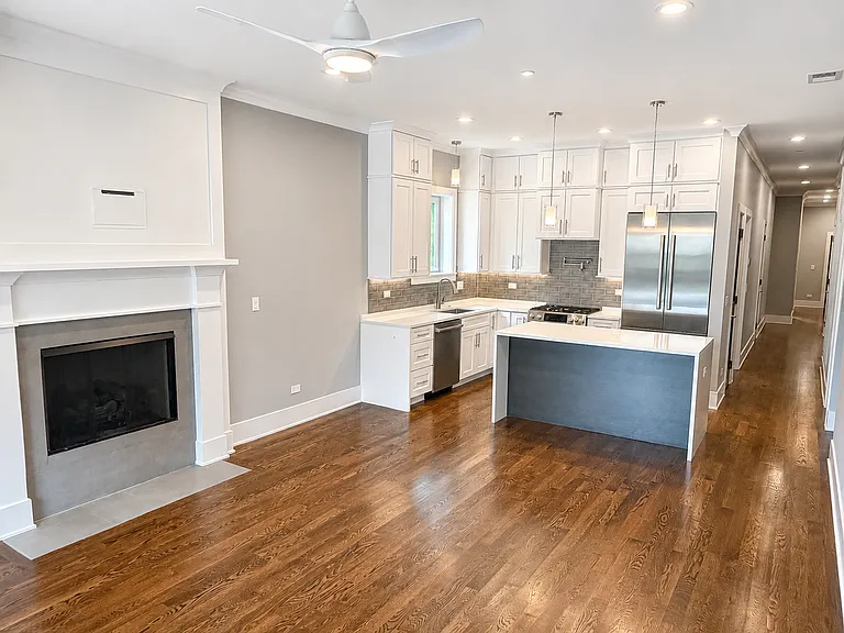 Living Room looking to Kitchen, Island with overhanging counter for bench seating