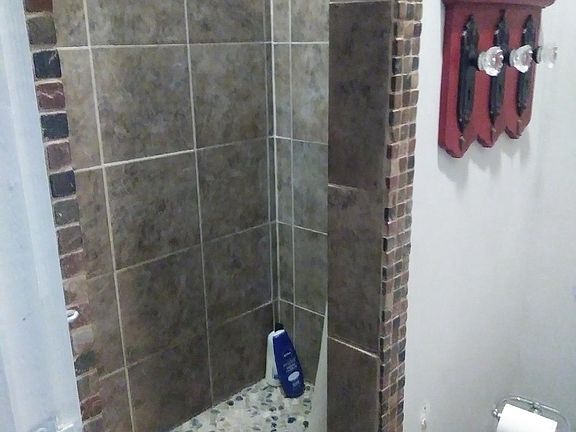 Master Bath with pebble shoer floor