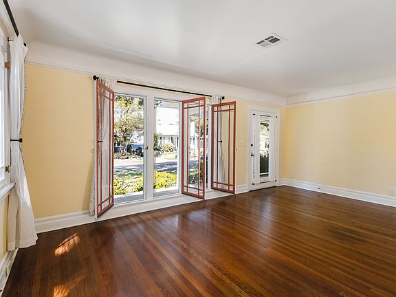 Living Room with Large Windows (Street View)