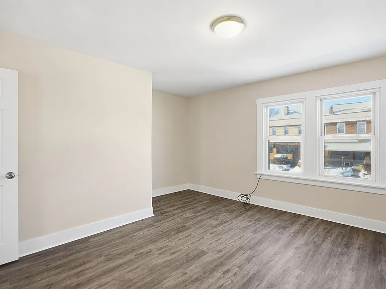 Charming Updated 2BR Home with New Flooring & Rear Porch — Photo 8