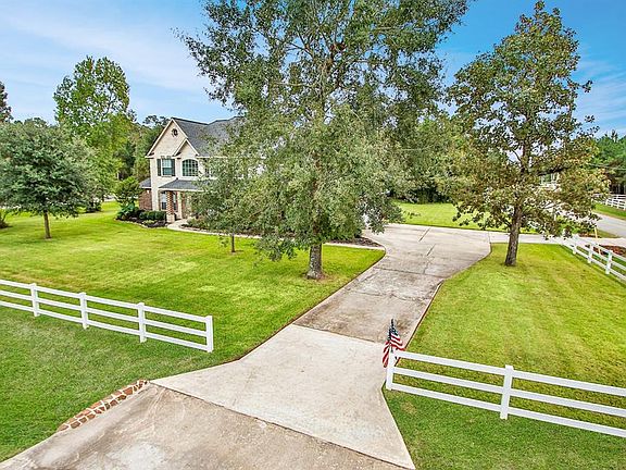 This corner lot allows for ample parking spaces in the front and side driveway.