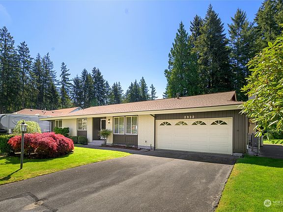 3rd image of 2932 SE Forest Villa Court