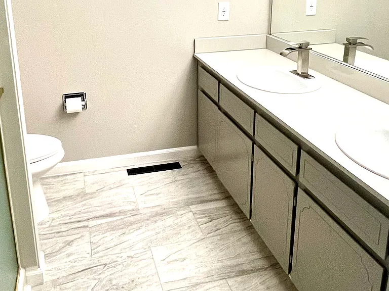 Primary Bathroom 
Walk-in shower
New double sinks 
New toilet 
New tile flooring 
Skylight
