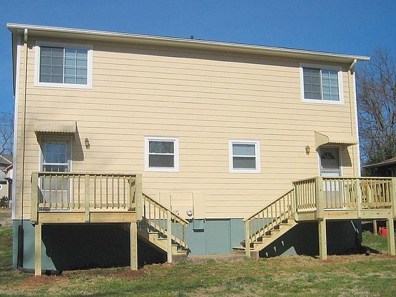Back with new windows, deck, hardiboard siding