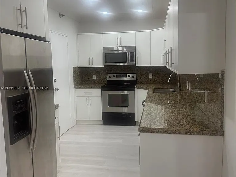 10185 Collins Ave #309 — Photo 7