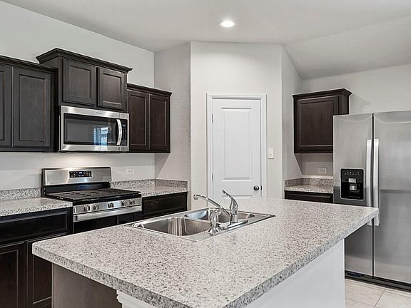 Photos shown here may not depict the specified home & features included are for illustration purposes only