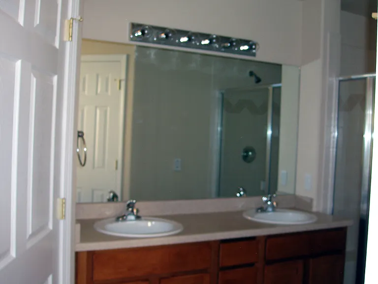Master Bathroom - Tub and Stand Alone Shower. Door on left commode.
Small wall heater on wall for addl heat.