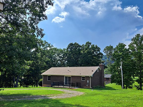 Back yard showing circular drive access.