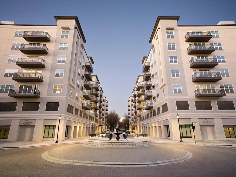 A welcoming streetscape frames the entrance to Modera Liberty Row, in the heart of Southpark.