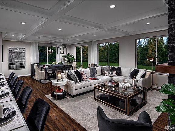 Home site 4 is a presale, photo shown of the model home which includes upgrades.