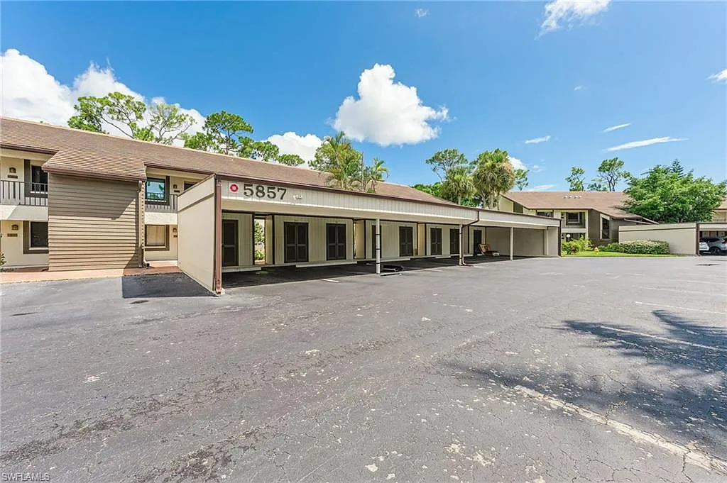 Building Photo - 5857 Rattlesnake Hammock Rd #208