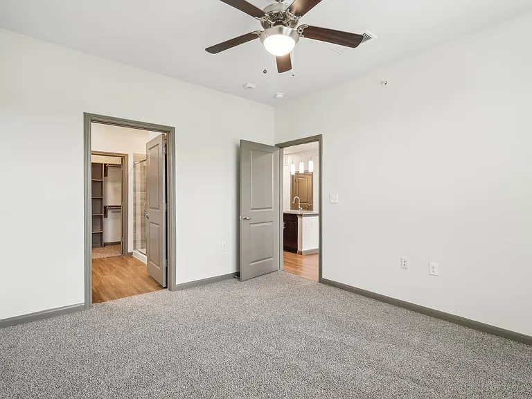 Spacious Bedroom and Connected Bathroom at Park at Rialto Apartments, San Antonio