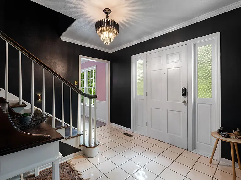Front entryway with a glimpse of the formal dining room