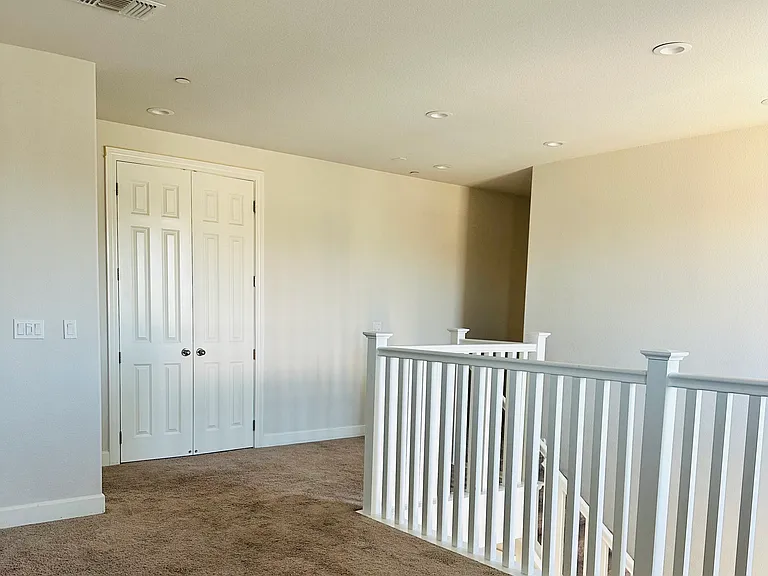 Loft and stairs (old pic) recently upgraded to hard wood floor