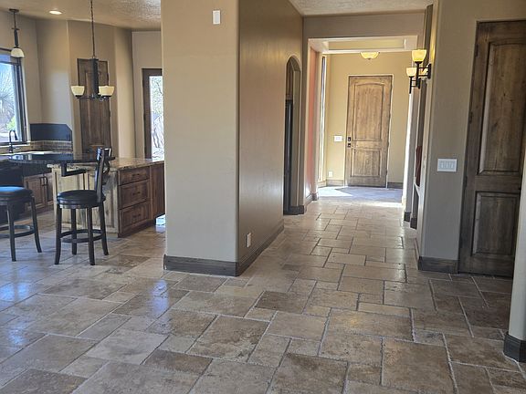 view of hallway and kitchen from living room