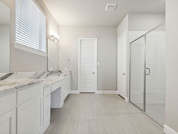 Primary Bathroom in the Eliot home plan by Trophy Signature Homes