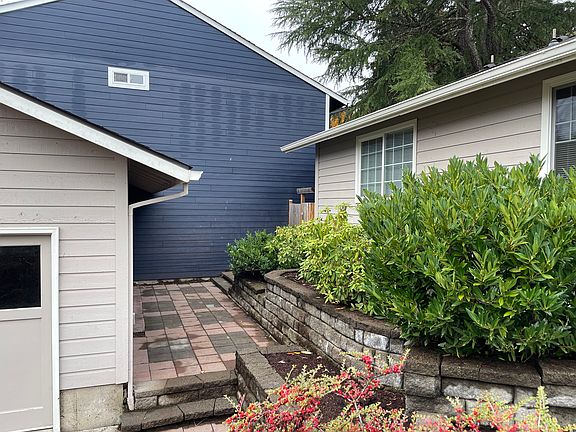 Side patio between the house and the garage.