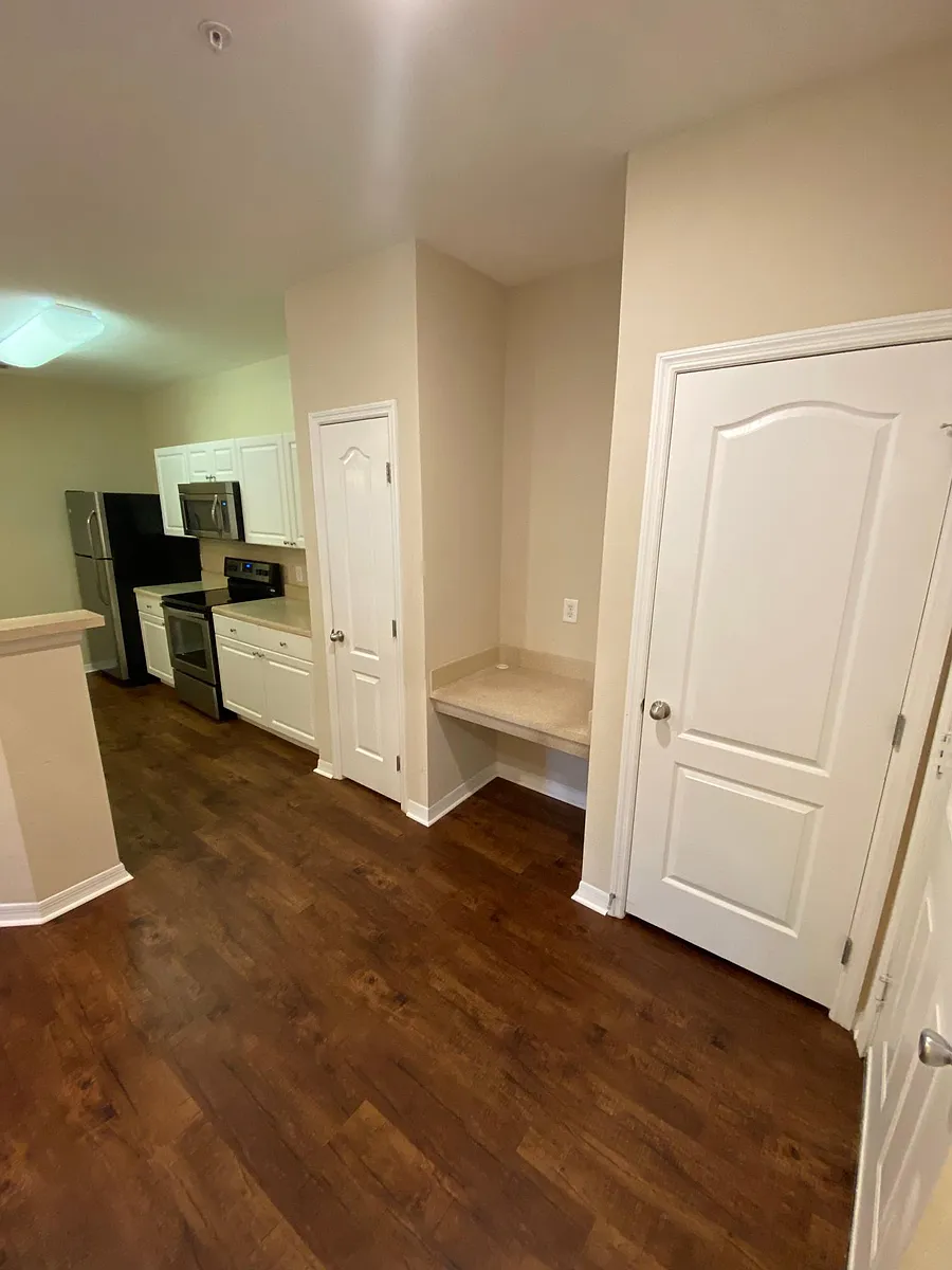 Entryway / Pantry & Utility Closet and Built-In Desk - 1600 Villa Capri Cir #309