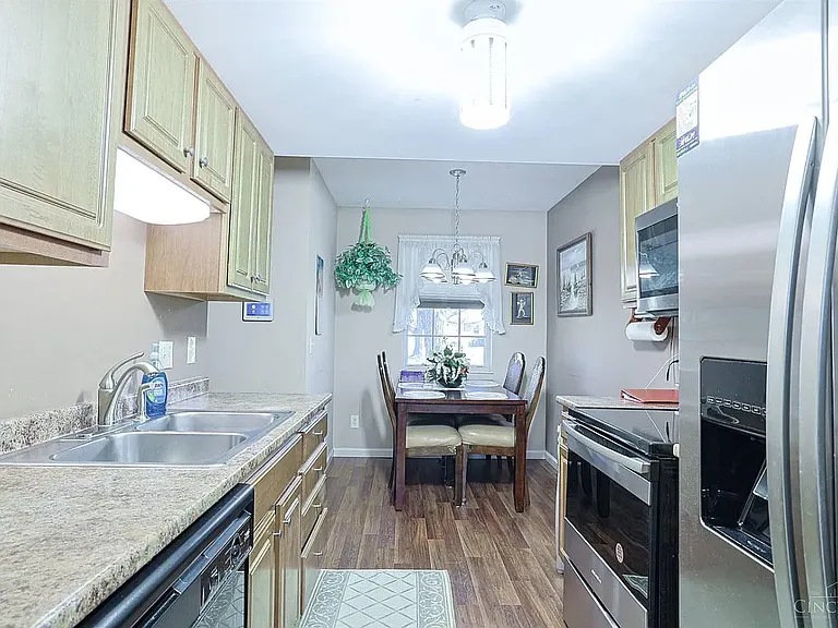 7519 Kingsgate Way — Photo 13