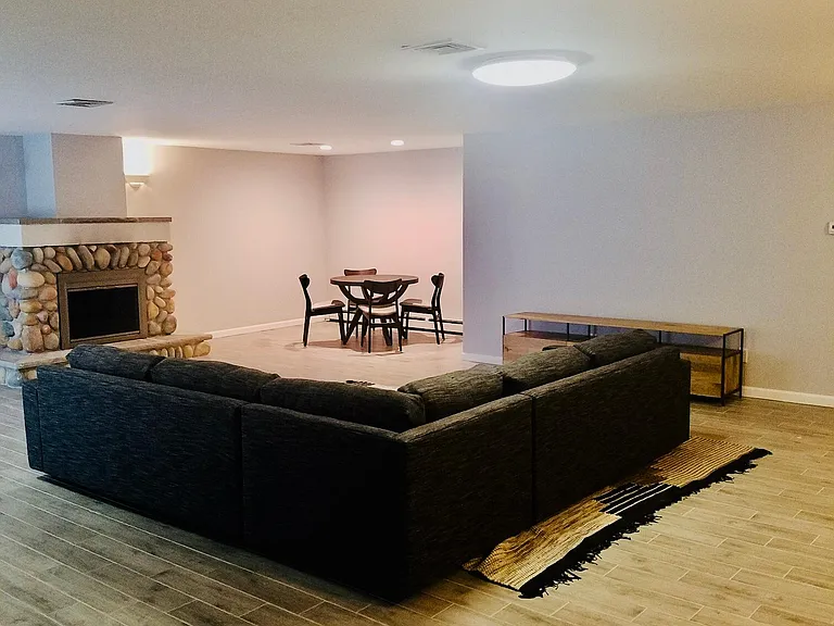 lower level entertainment room with flat screen tv