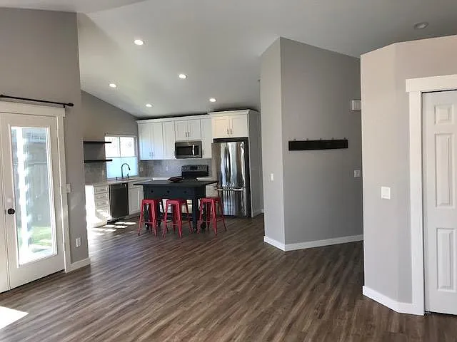 View into kitchen, french doors to sunny patio
