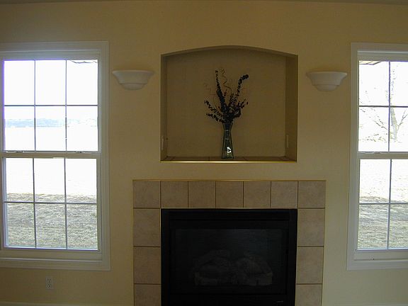Fireplace. Media alcove above.