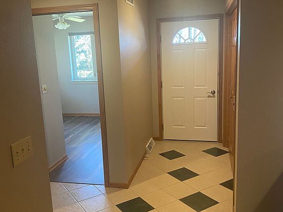 Front entry and access to bedroom