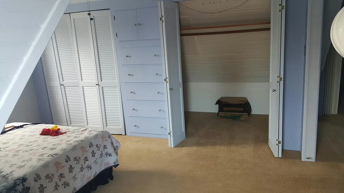 built in chest of drawers with double closets and extra stor
