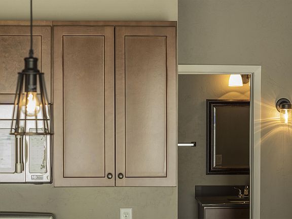 Ceiling Lights above Kitchen and Light on right-hand side of