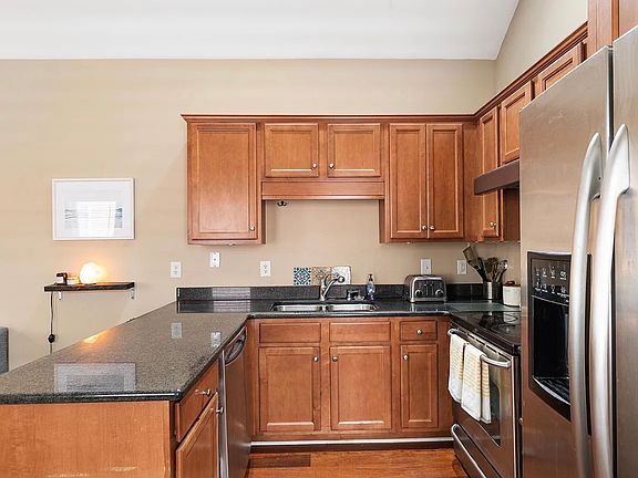 Kitchen is well appointed with plenty of storage and a dishwasher