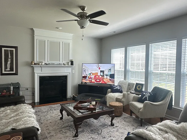 Family room, facing to the south, huge windows, lots of light!
