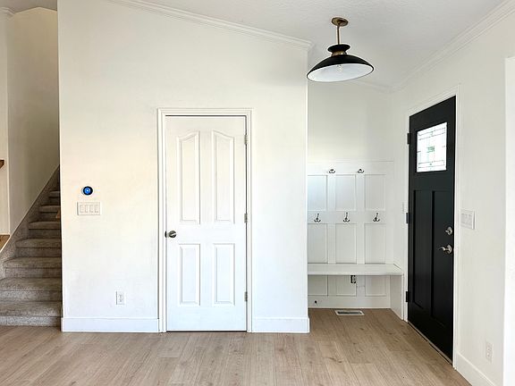 Front entry door and coat closet