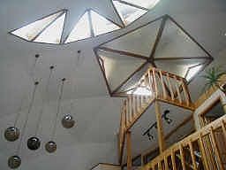 Looking up from family room towards skyights